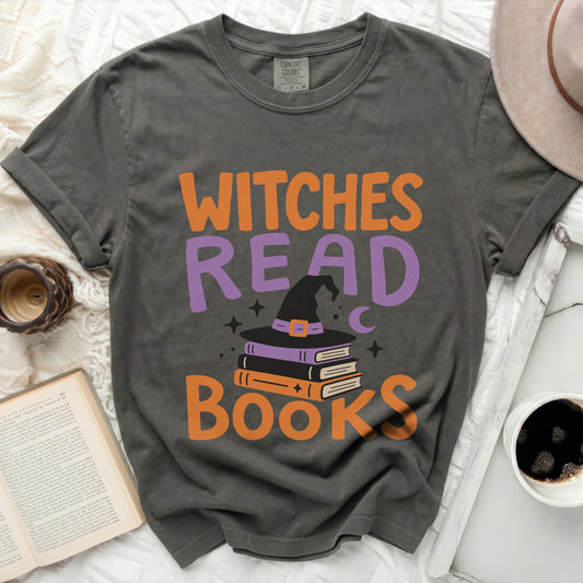 Dark grey t-shirt with "WITCHES READ BOOKS" and witch hat graphic.