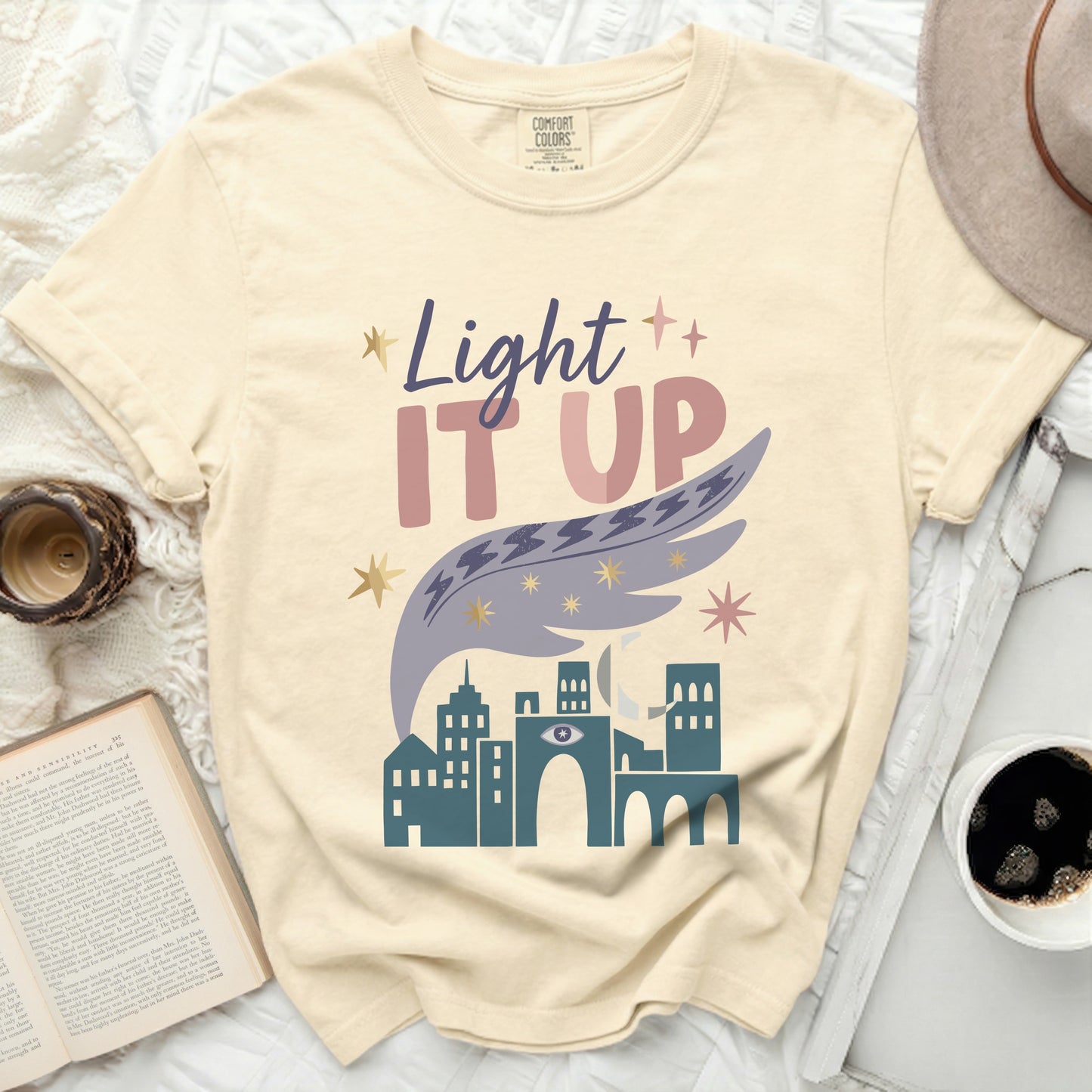 Comfort Colors t-shirt with "Light IT UP" text and city graphic.