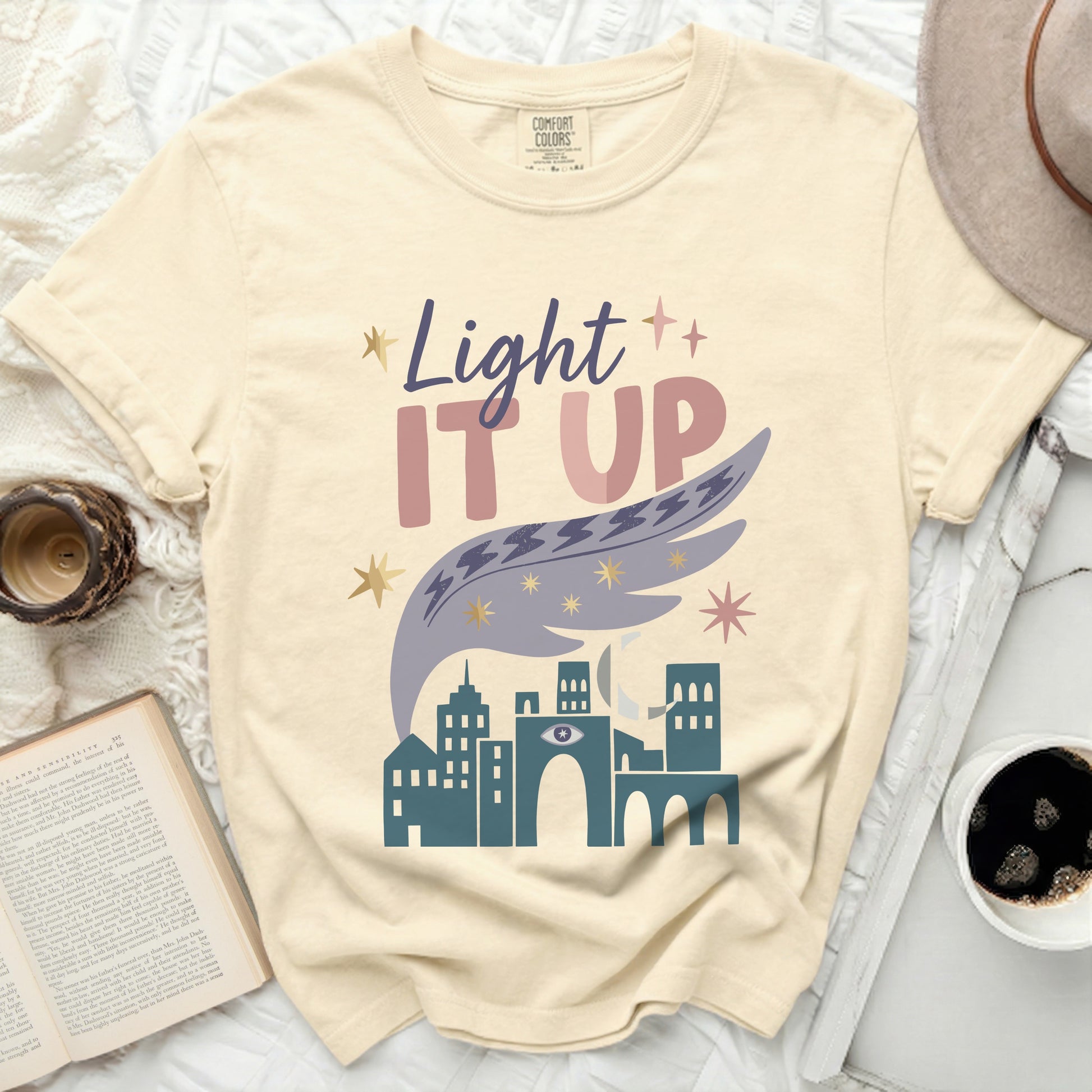 Comfort Colors t-shirt with "Light IT UP" text and city graphic.
