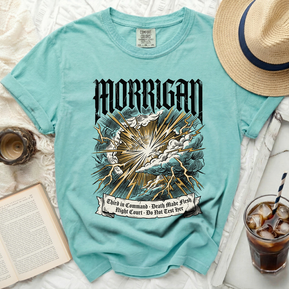 Teal t-shirt with "MORRIGAN" and lightning storm design.
