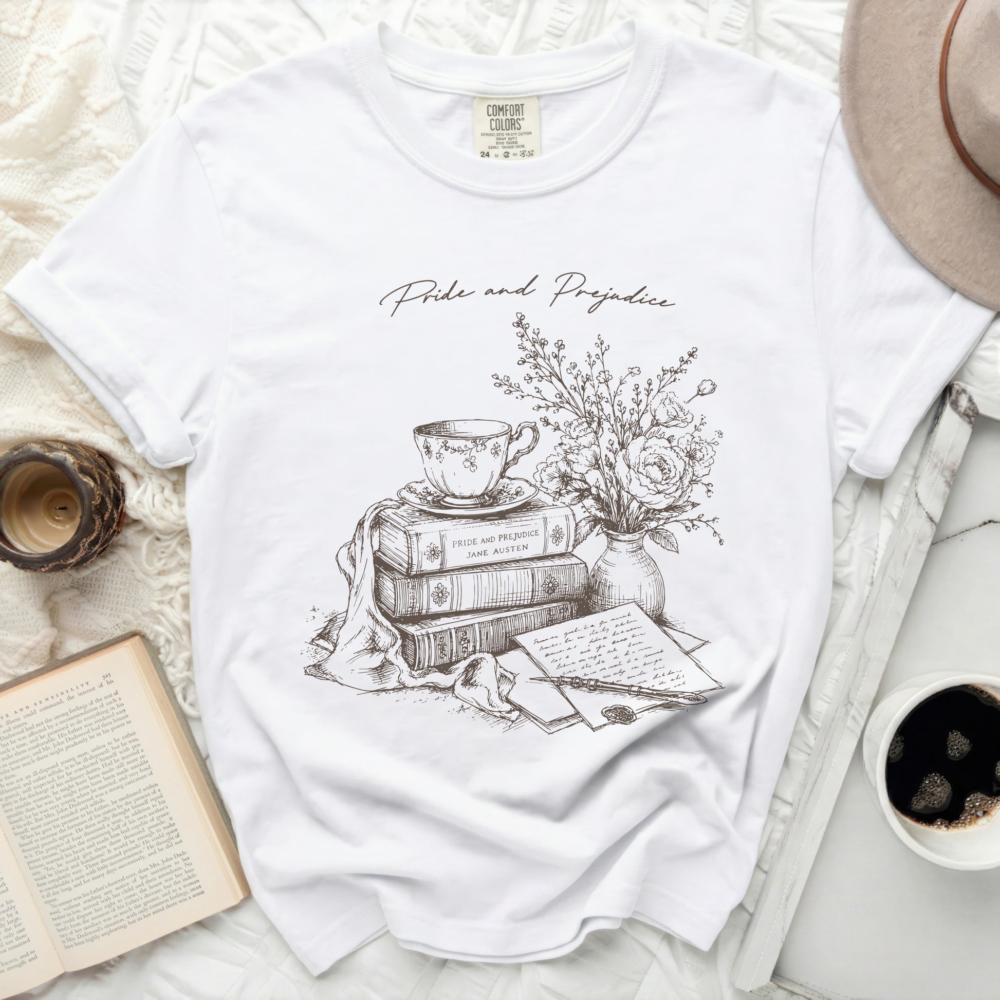 White t-shirt with "Pride and Prejudice Jane Austen" book illustration.
