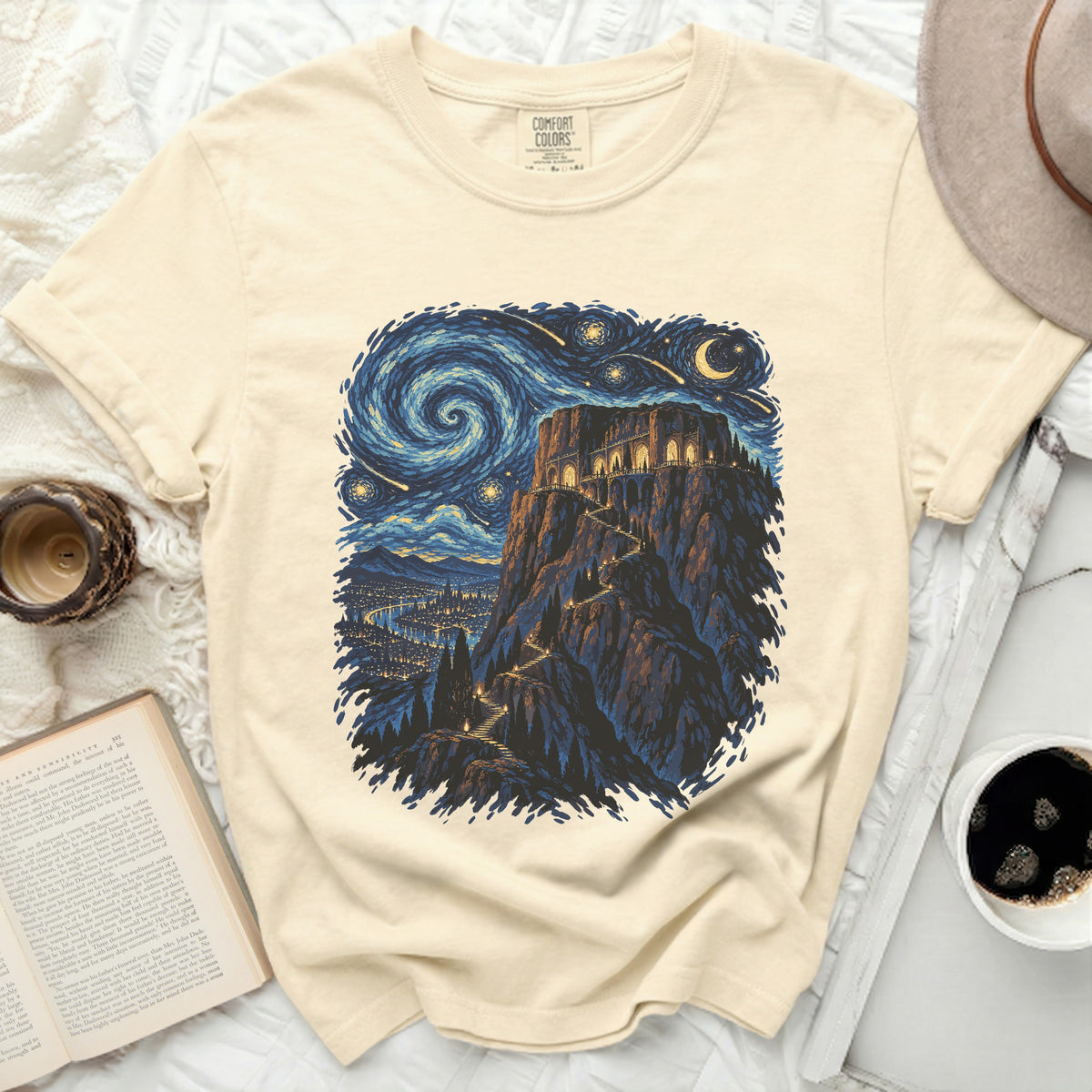 Cream t-shirt with a night sky and castle illustration, inspired by Starry Night.