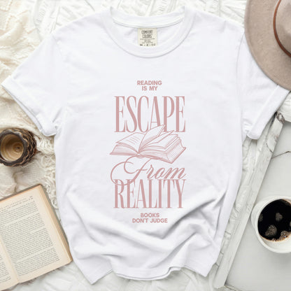 White t-shirt with "Reading is my Escape From Reality" graphic.