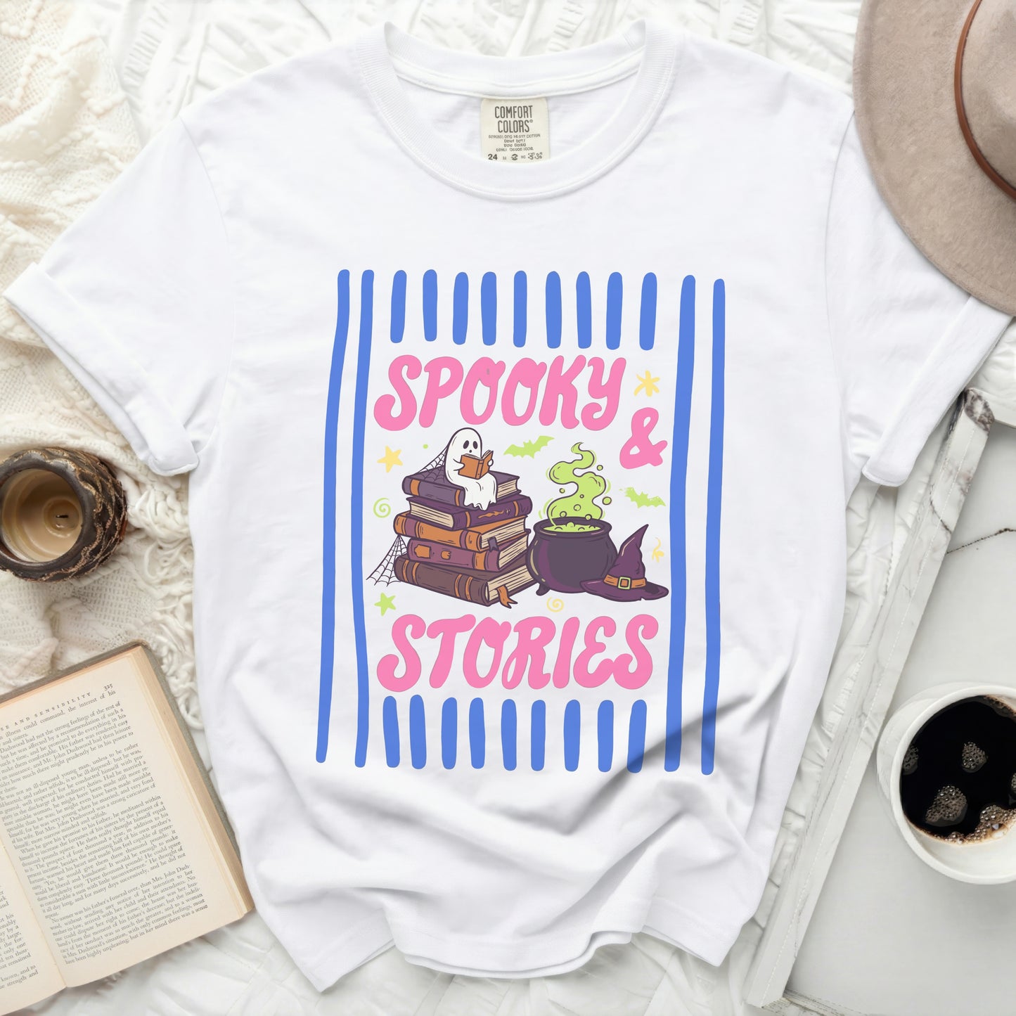 White t-shirt with "Spooky & Stories" text and Halloween graphics.