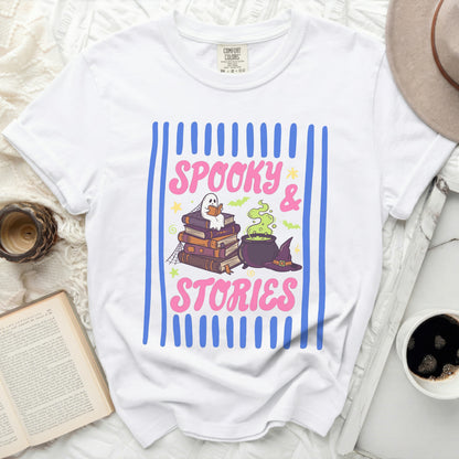 White t-shirt with "Spooky & Stories" text and Halloween graphics.