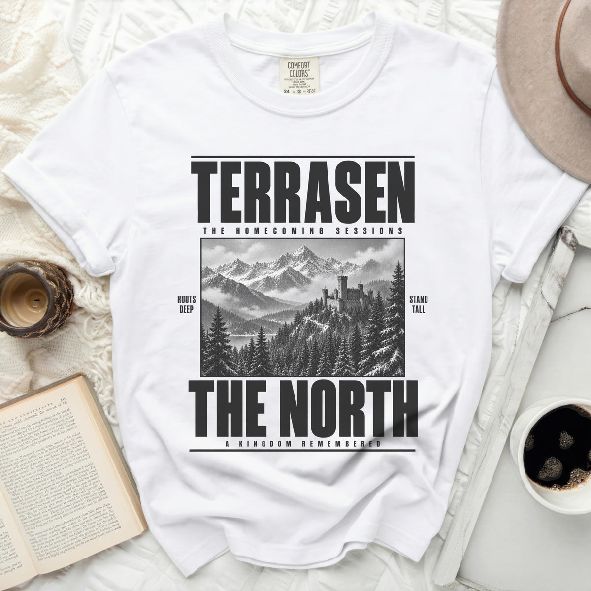White t-shirt with "Terrasen The Homecoming Sessions" and a mountain castle graphic.