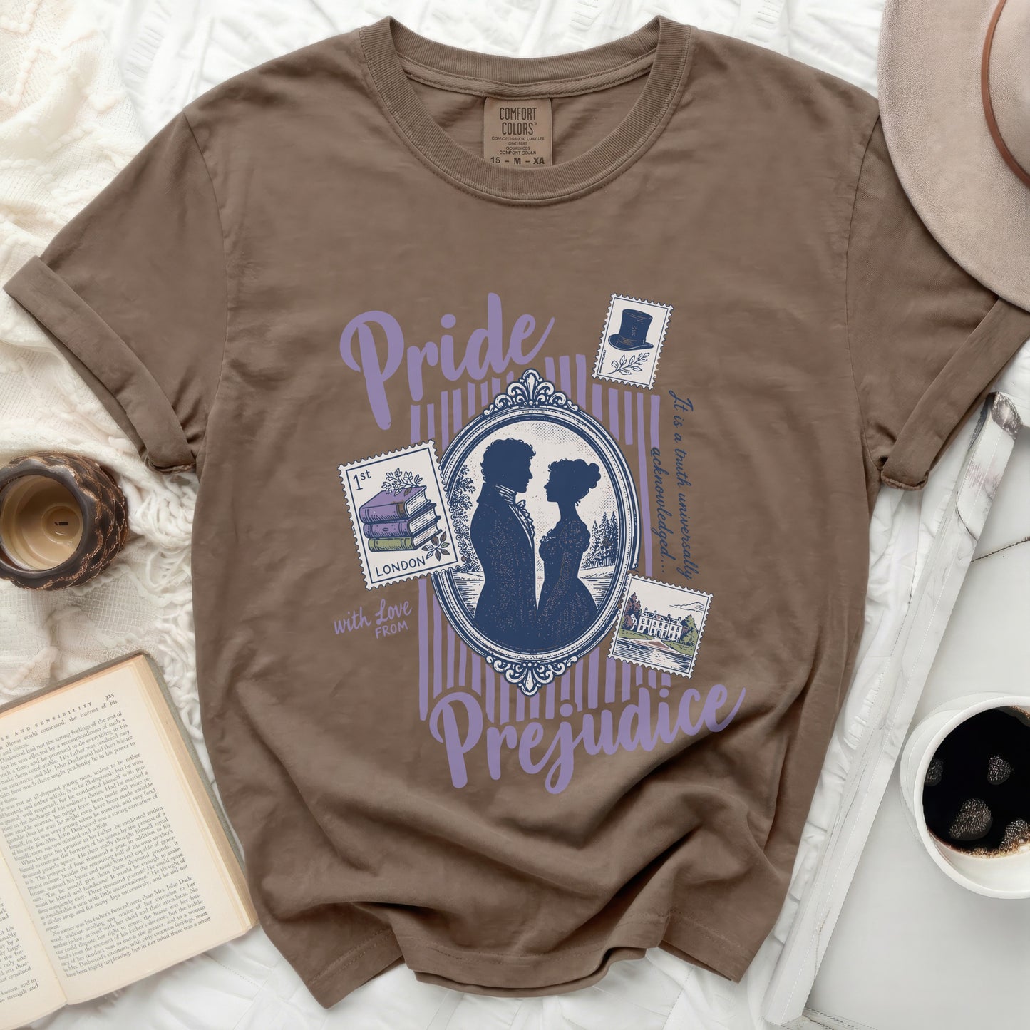Brown t-shirt with Pride and Prejudice graphic featuring silhouette couple and stamps