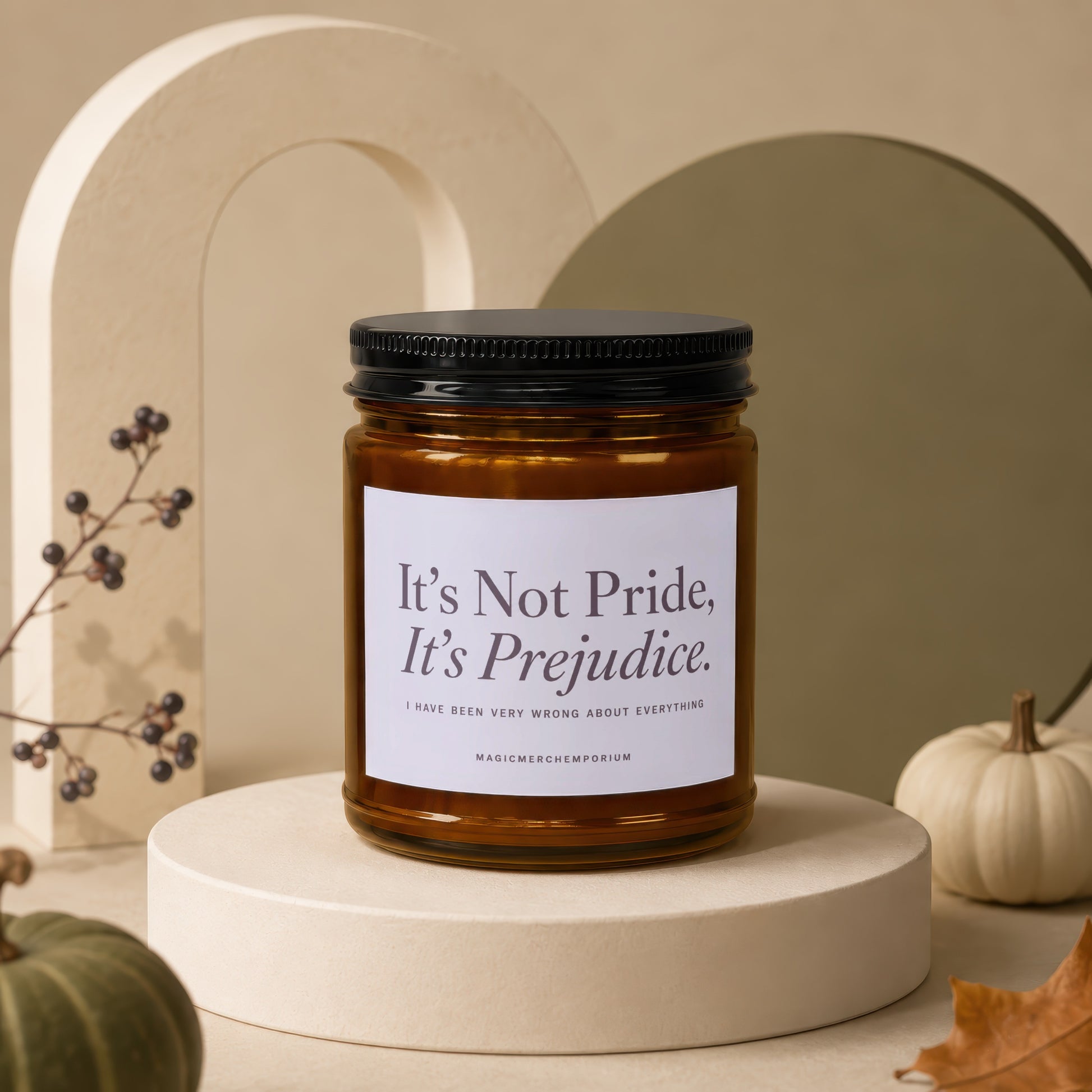 Amber jar candle with black lid reads "It's Not Pride, It's Prejudice."