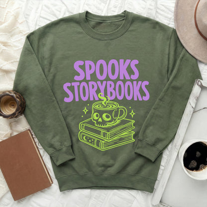 Green sweatshirt with "Spooks Storybooks" text and skull mug on books graphic.