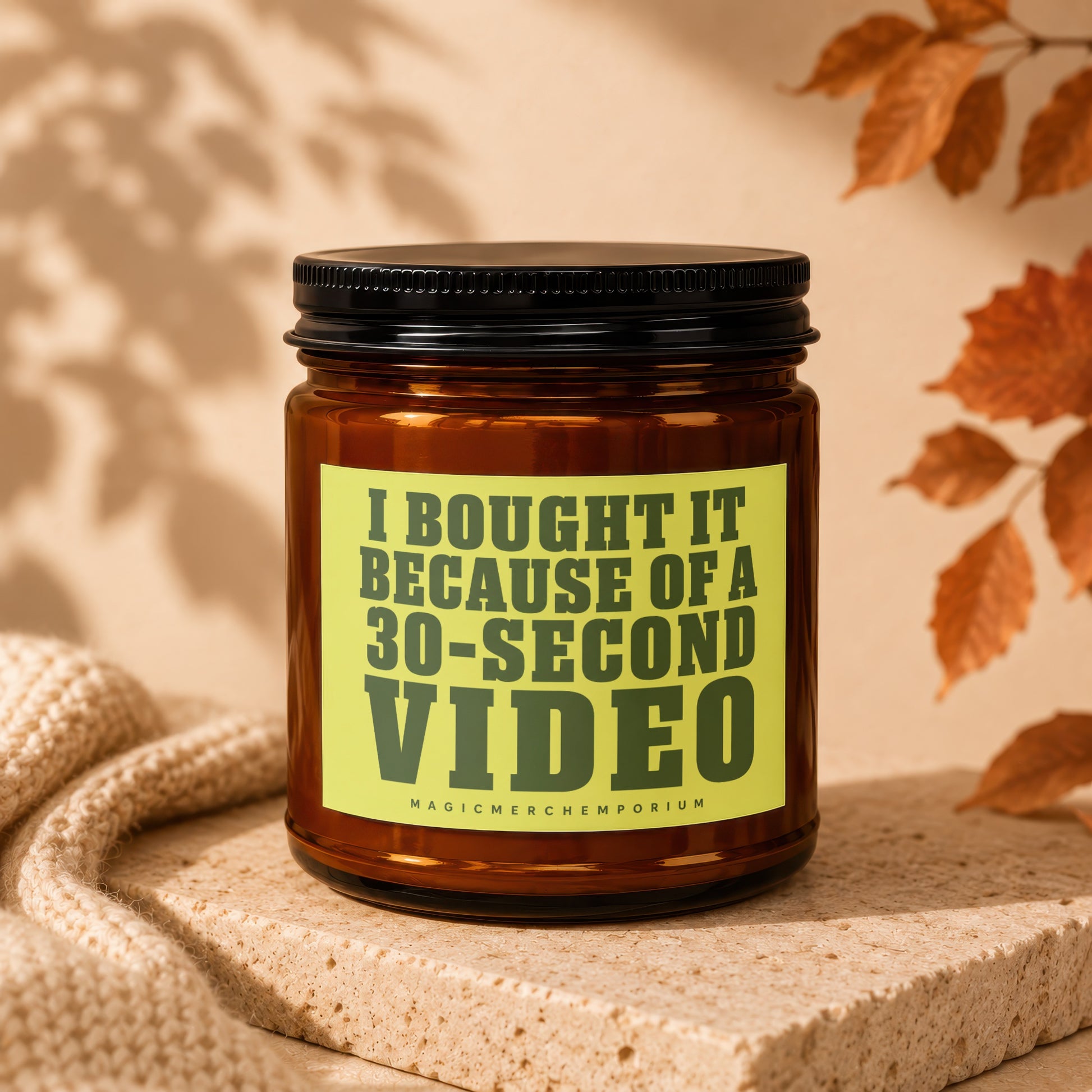 Brown glass candle labeled "I BOUGHT IT BECAUSE OF A 30-SECOND VIDEO".