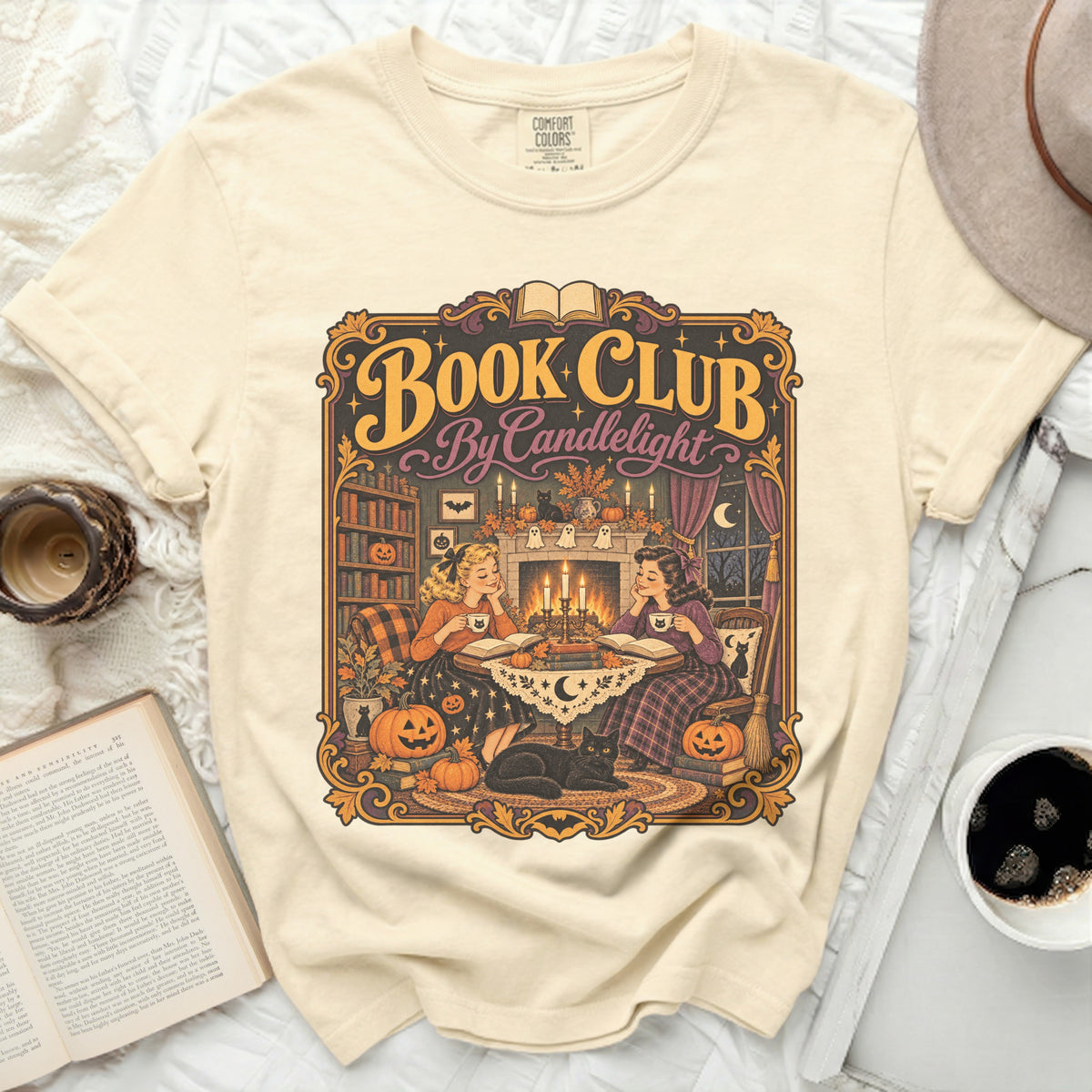 Cream t-shirt with "Book Club By Candlelight" Halloween-themed graphic.