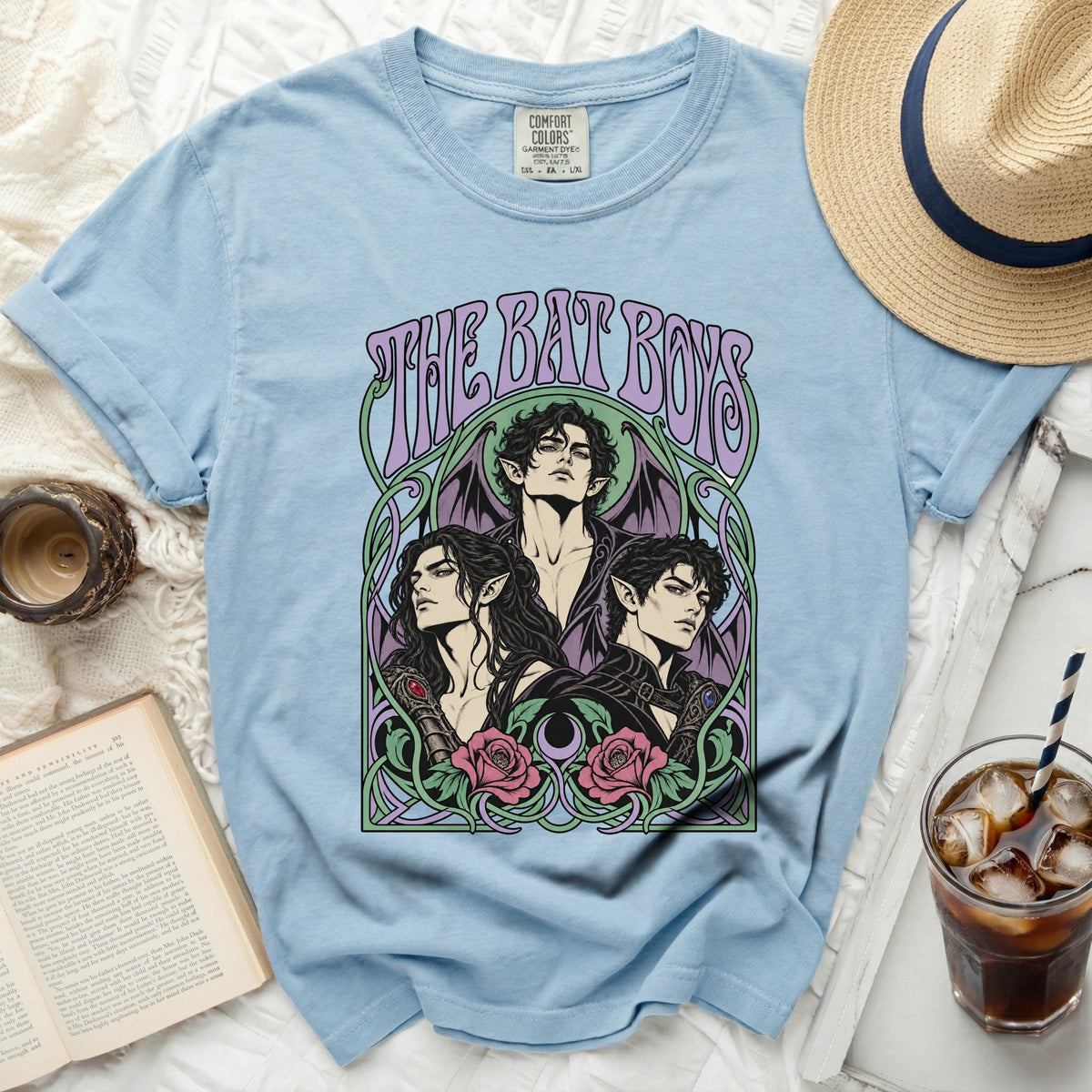 Light blue Comfort Colors t-shirt with "The Bat Boys" text and fantasy character art.