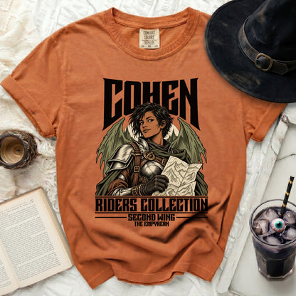 Orange t-shirt with "COHEN RIDERS COLLECTION SECOND WING THE EMPYREAN" graphic.