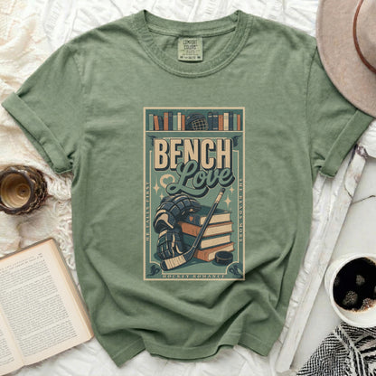 T-shirt with "Bench Love" text, hockey gear, and books.