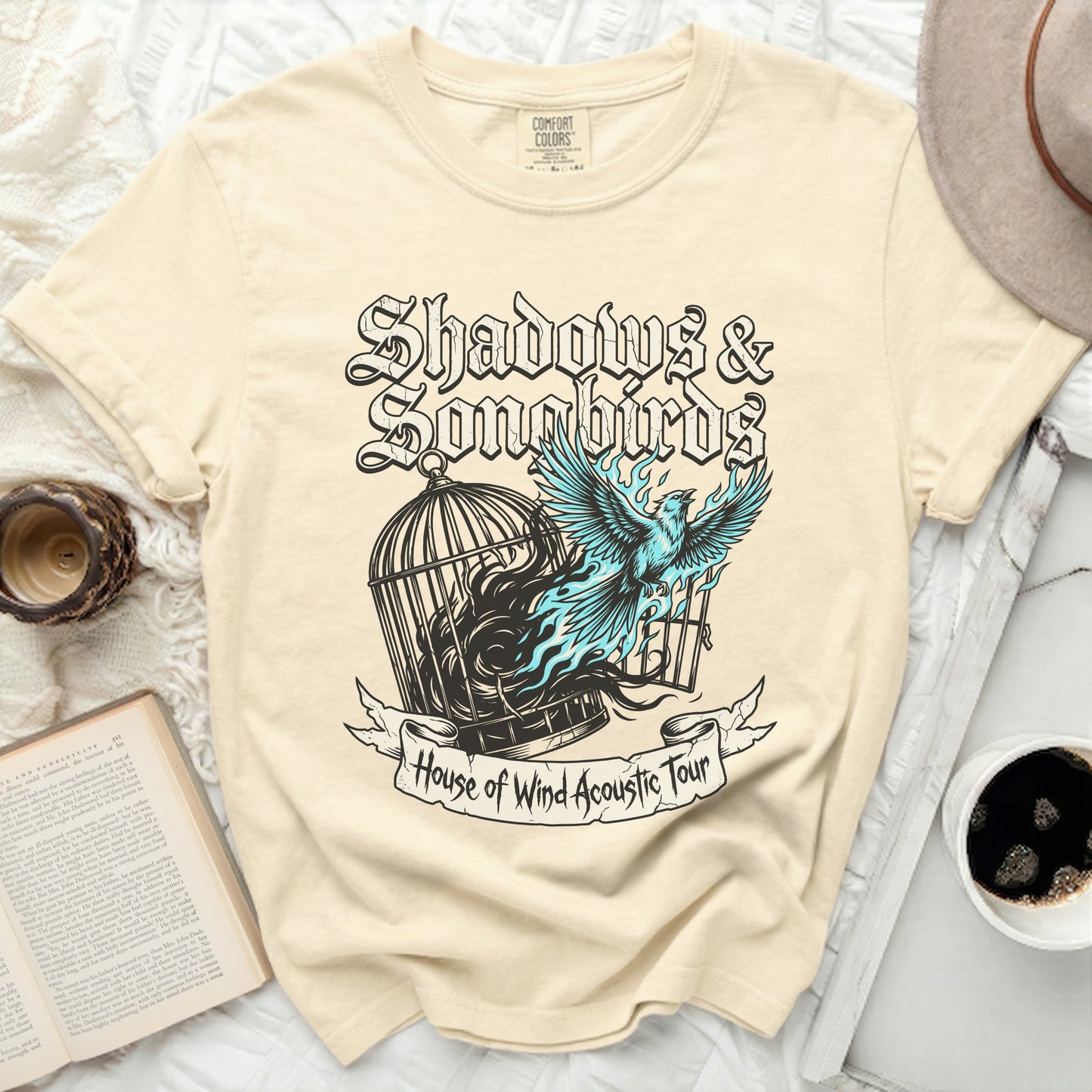 Cream t-shirt with "Shadows & Songbirds" and "House of Wind Acoustic Tour" graphics.