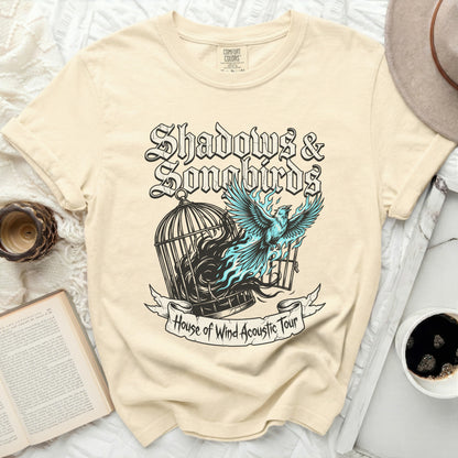Cream t-shirt with "Shadows & Songbirds" and "House of Wind Acoustic Tour" graphics.
