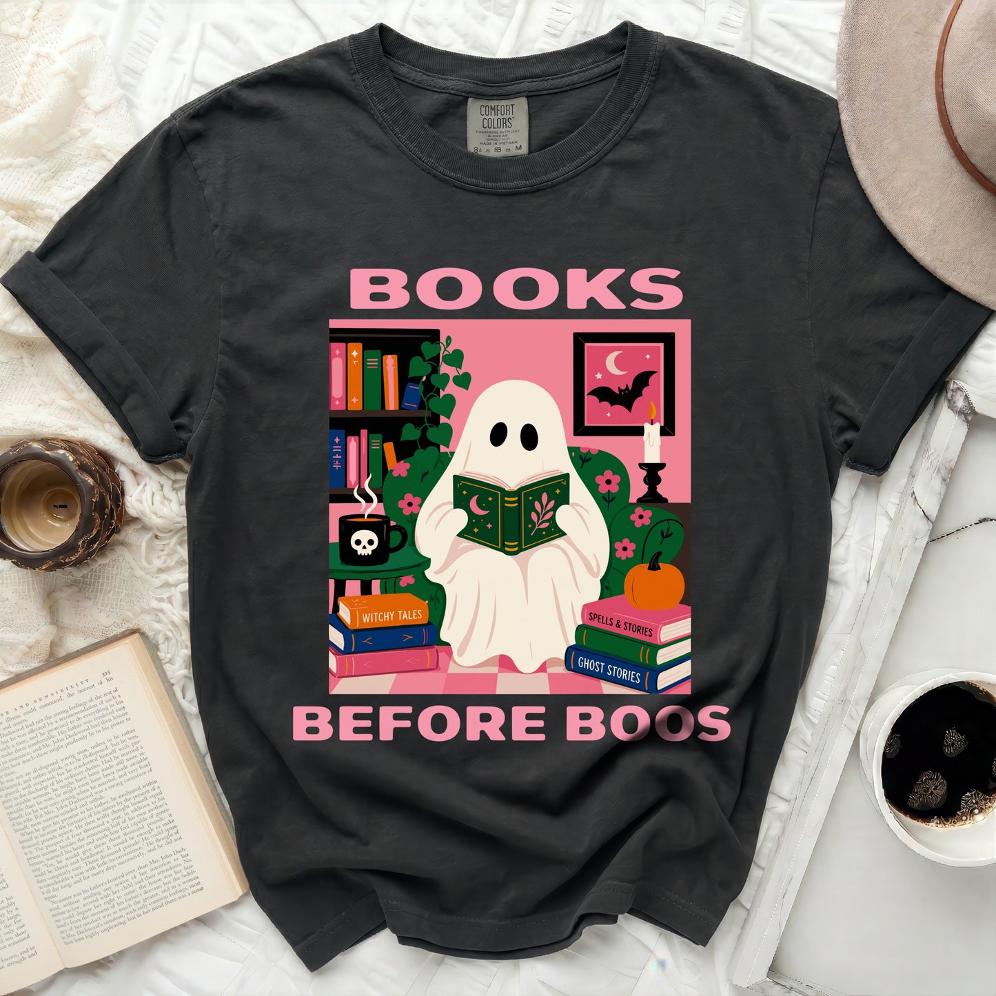 Ghost reading a book with "Books Before Boos" text and Halloween illustrations.