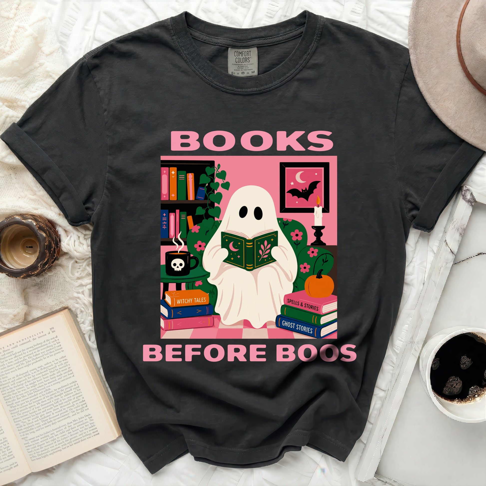 Ghost reading a book with "Books Before Boos" text and Halloween illustrations.