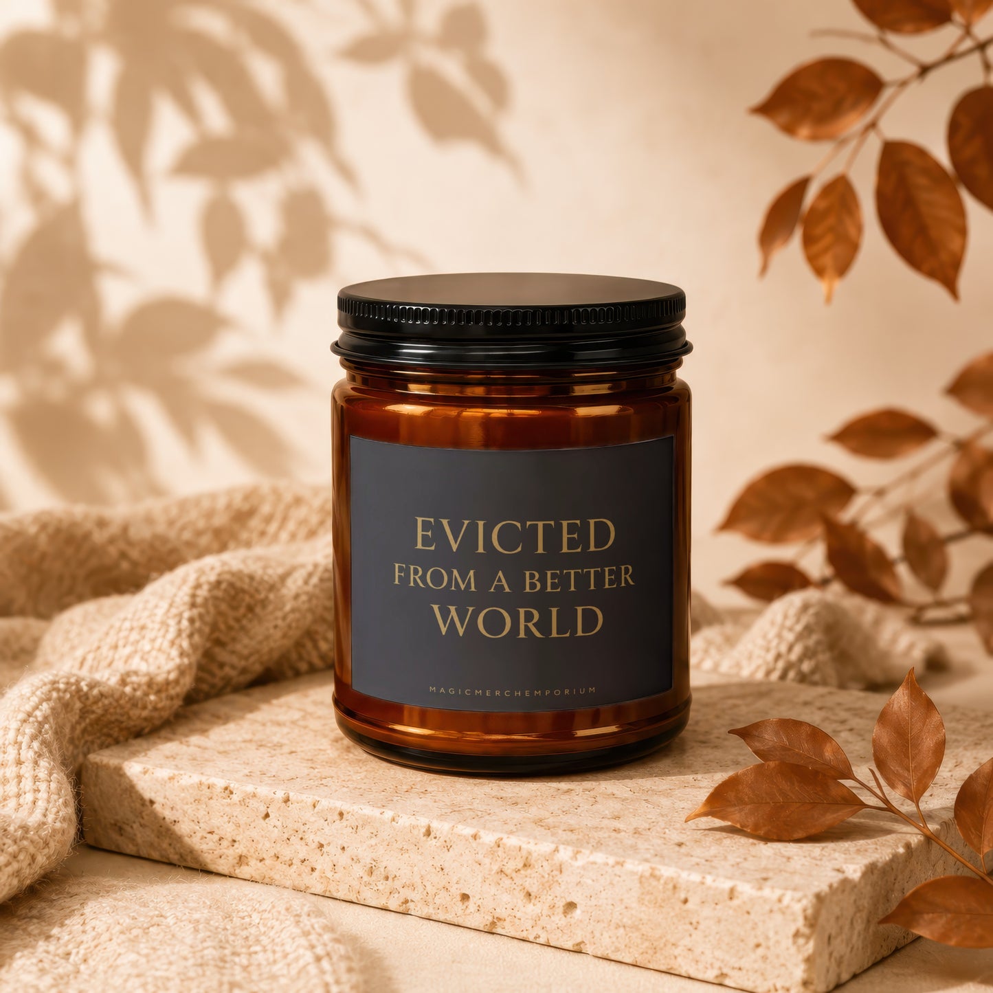 Amber jar candle with black lid, "Evicted from a Better World" text.