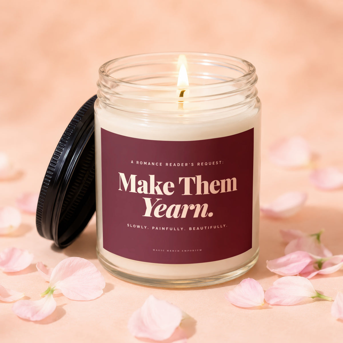 Candle with lit wick and text "Make Them Yearn."