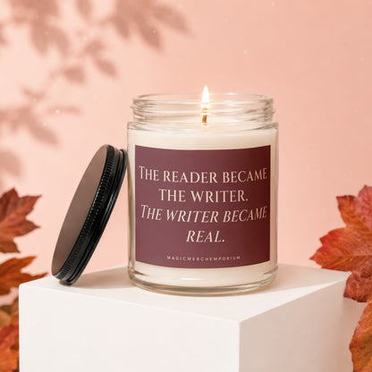 Candle with the quote "The reader became the writer. The writer became real."