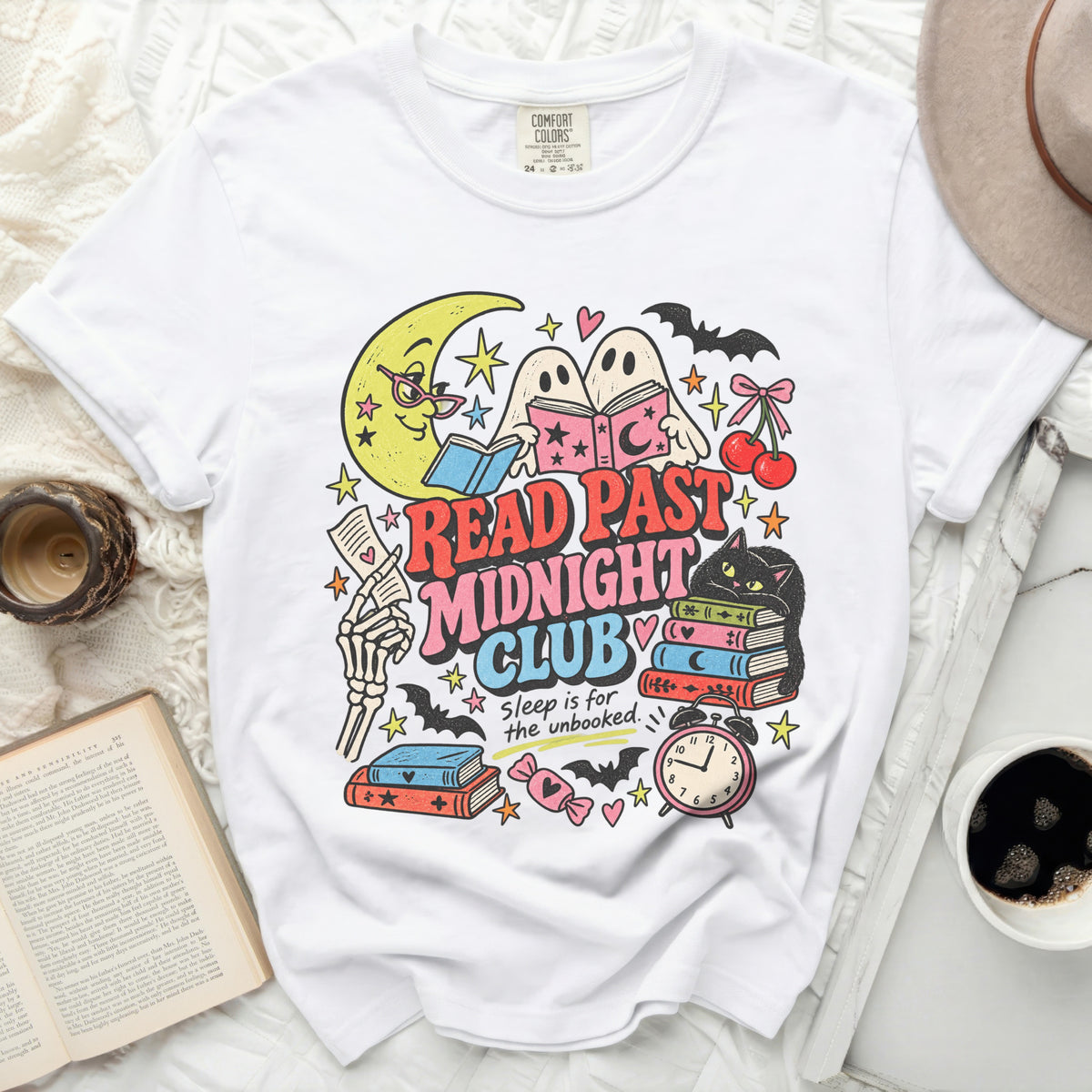 White t-shirt graphic with "Read Past Midnight Club" and reading ghosts.