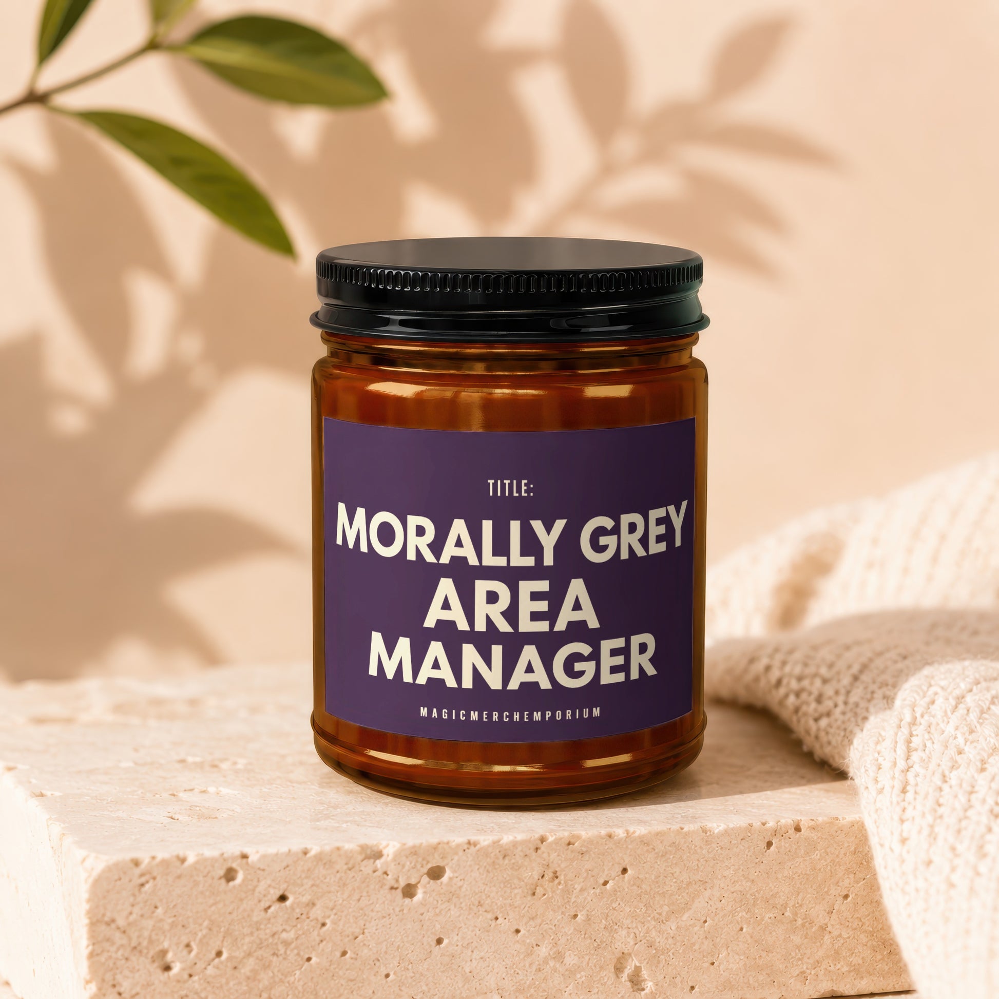 Jar with "Morally Grey Area Manager" text on purple label.