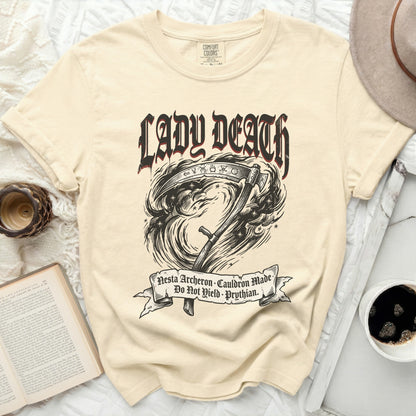 Cream t-shirt with "Lady Death" and scythe graphic, text "Nesta Archeron Cauldron Made Do Not Yield Prythian".