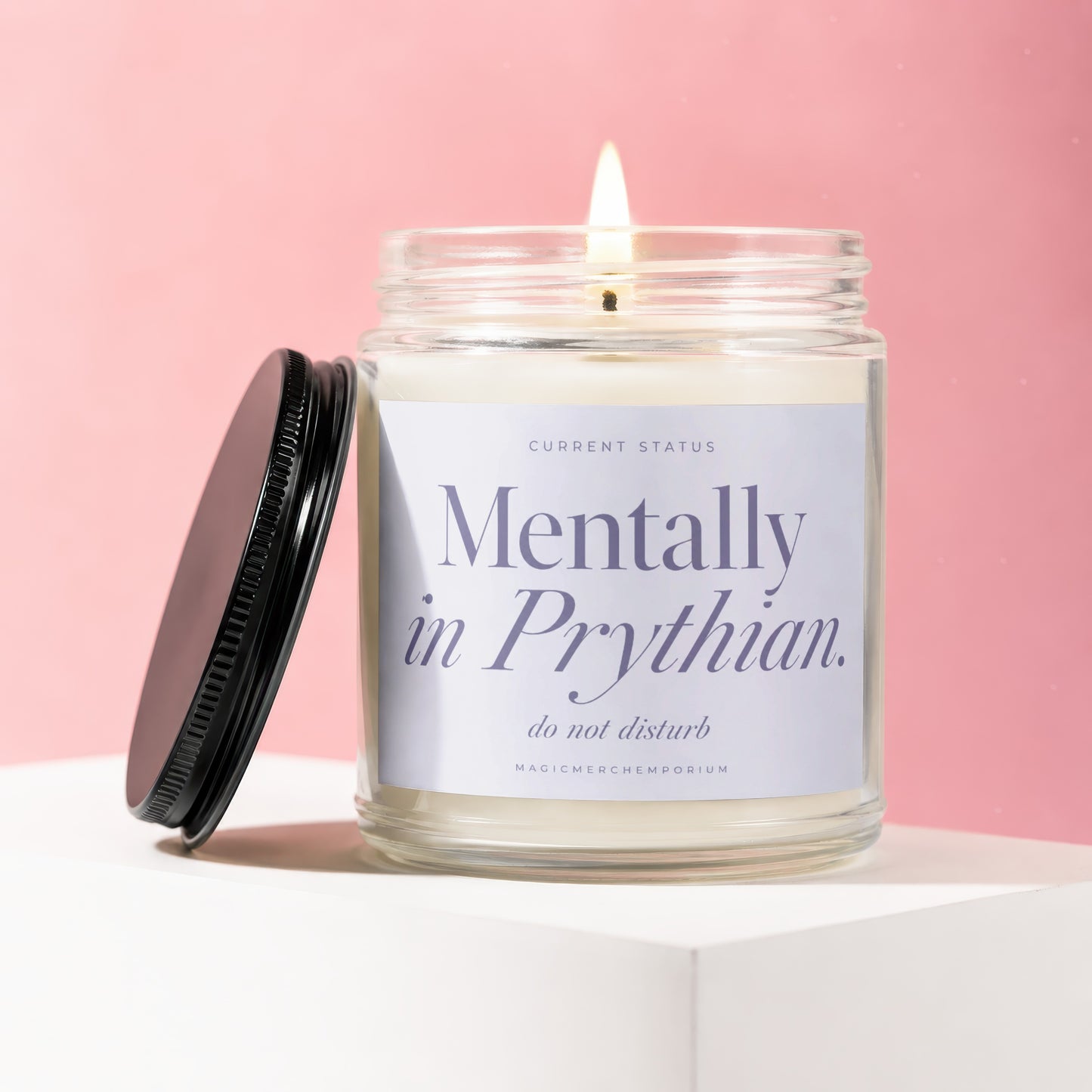 Candle labeled "Mentally in Prythian. do not disturb" on a pink background.