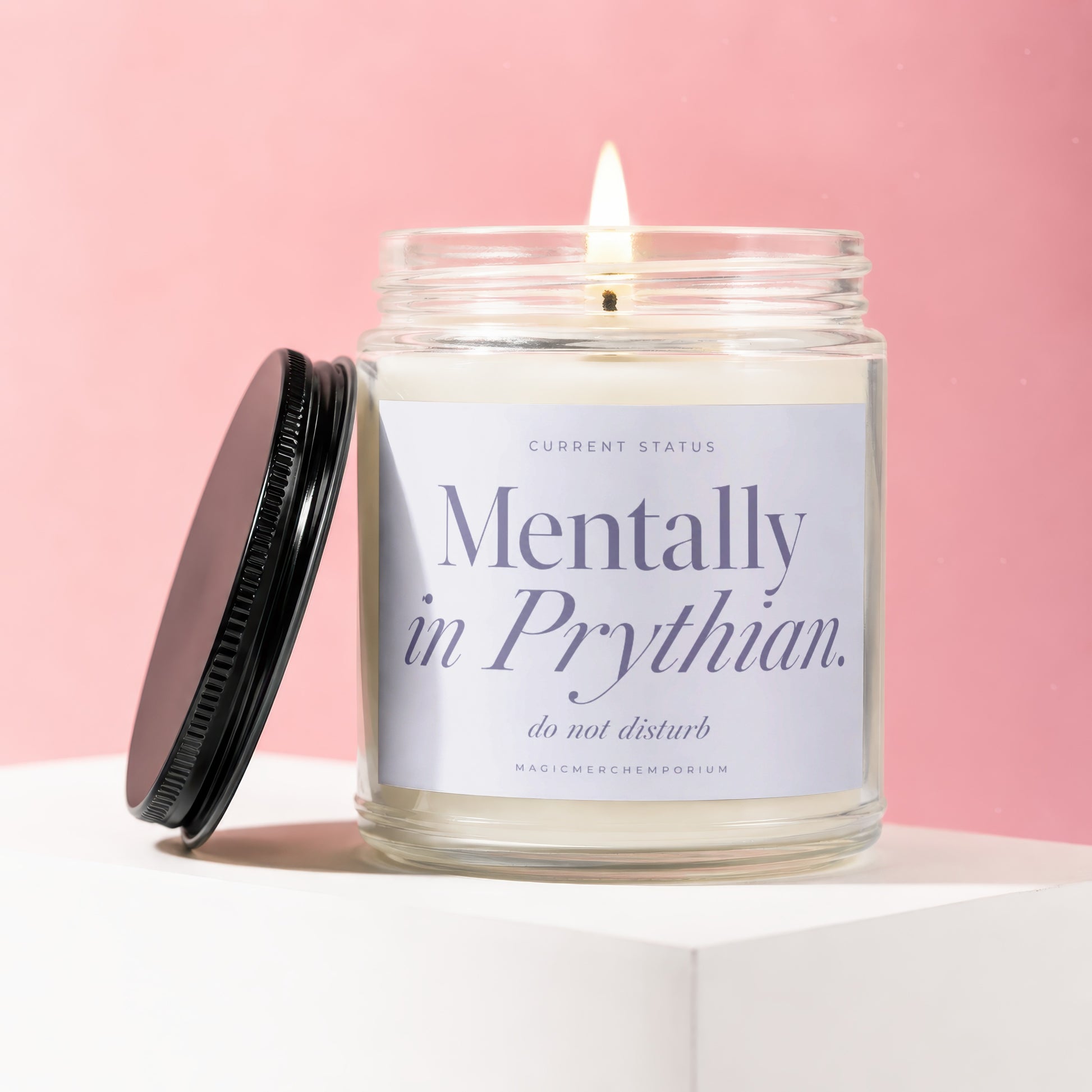 Candle labeled "Mentally in Prythian. do not disturb" on a pink background.