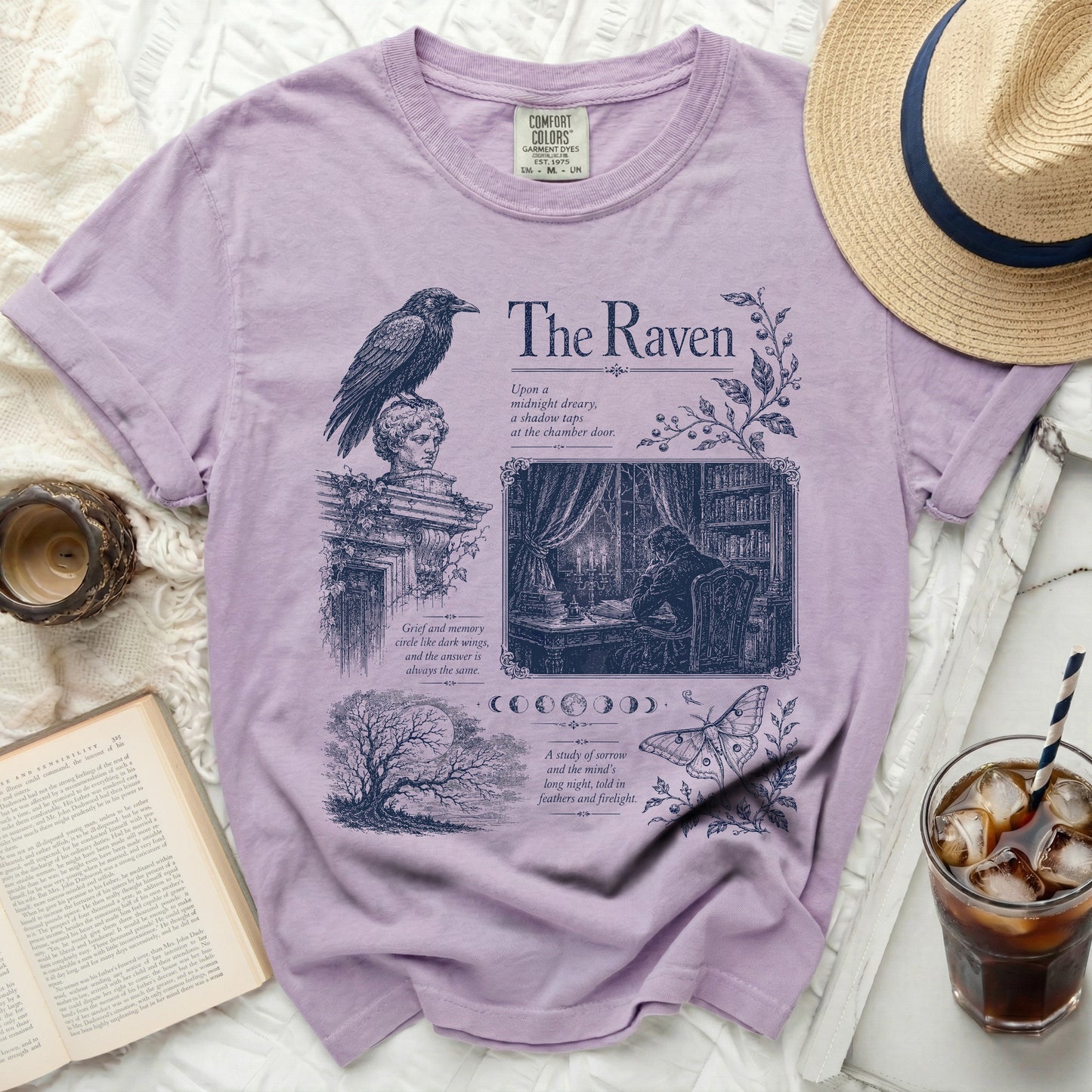 Lavender t-shirt with "The Raven" design featuring a crow, bust, books, and text.