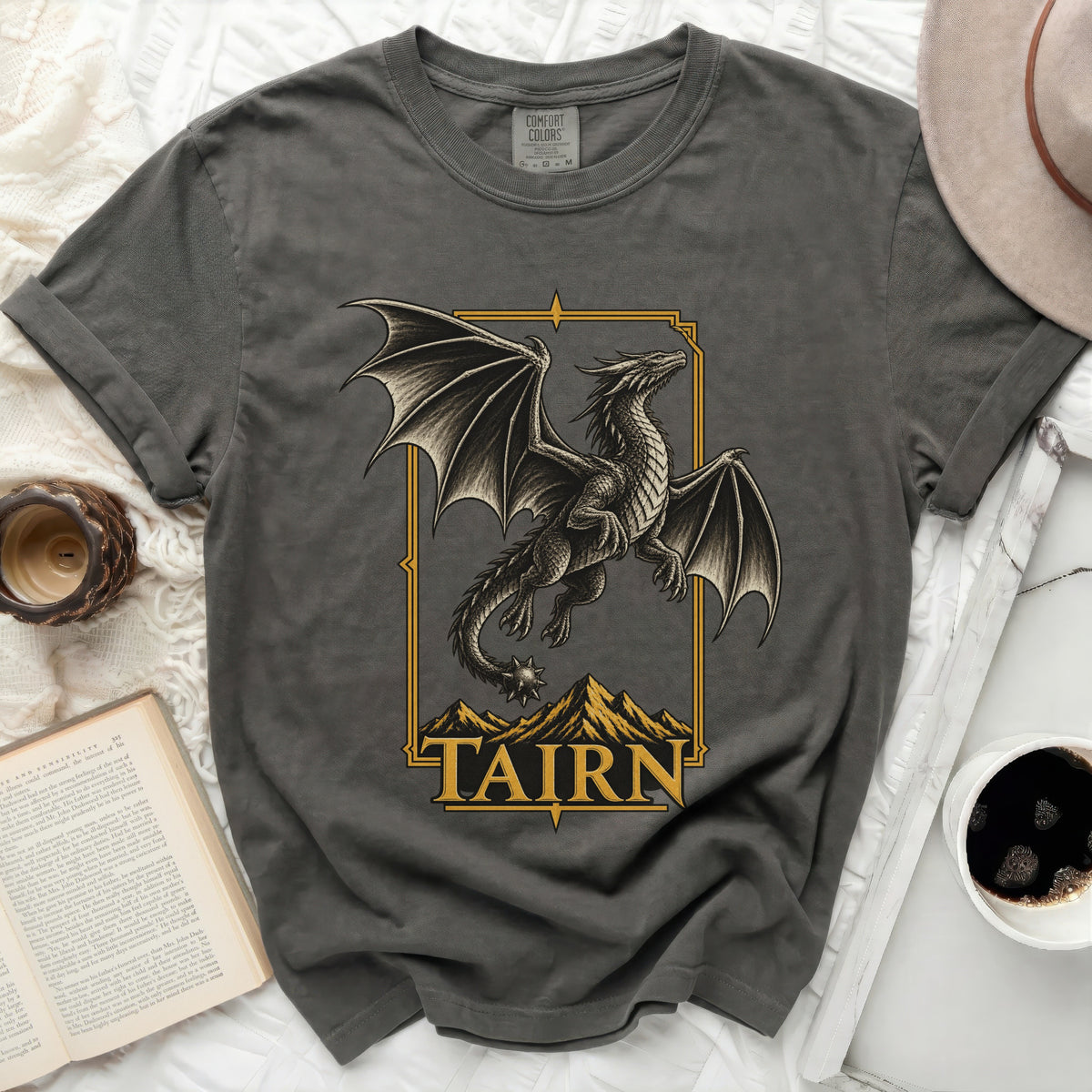 Grey t-shirt with a dragon graphic and the word "TAIRN" in yellow.