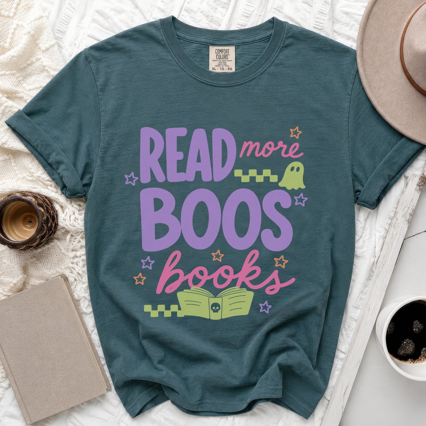 Teal t-shirt with "READ more BOOS books" text, a ghost, and a skull book.