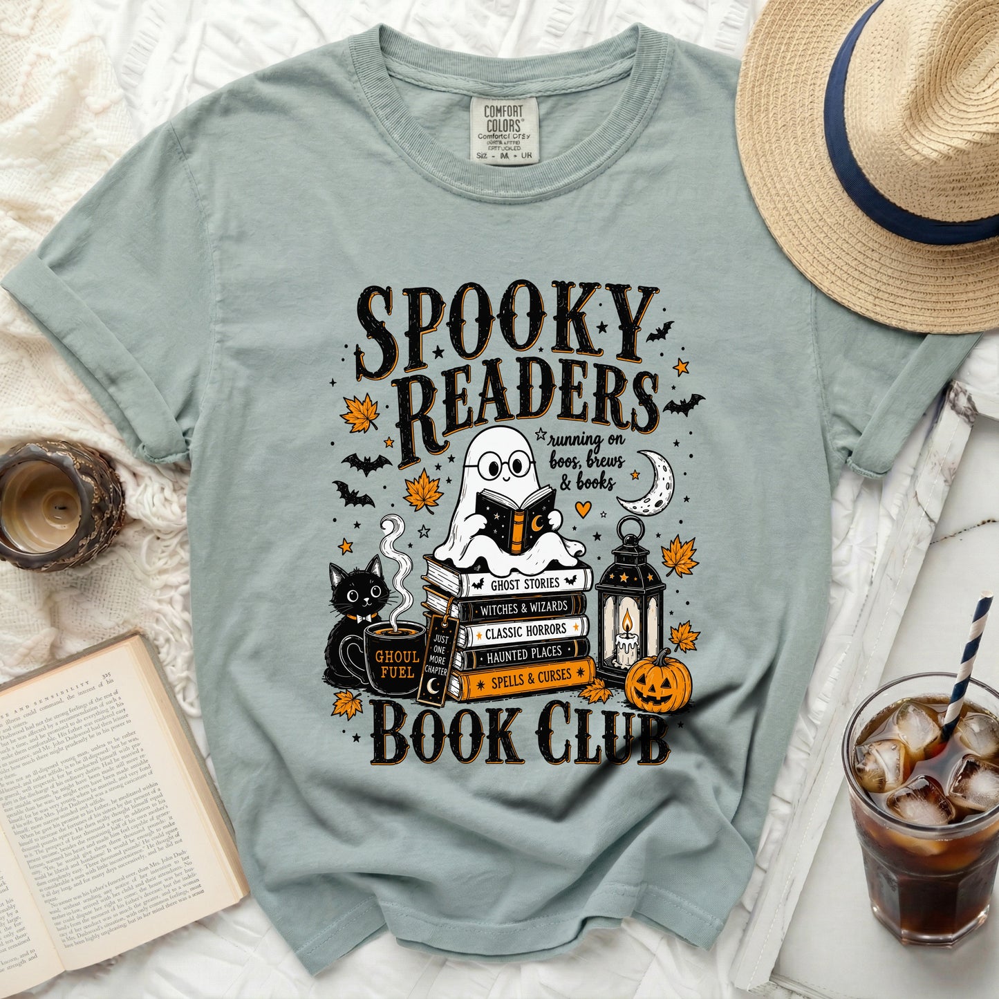 Spooky Readers Book Club t-shirt with ghost, cat, pumpkin, and book graphics.