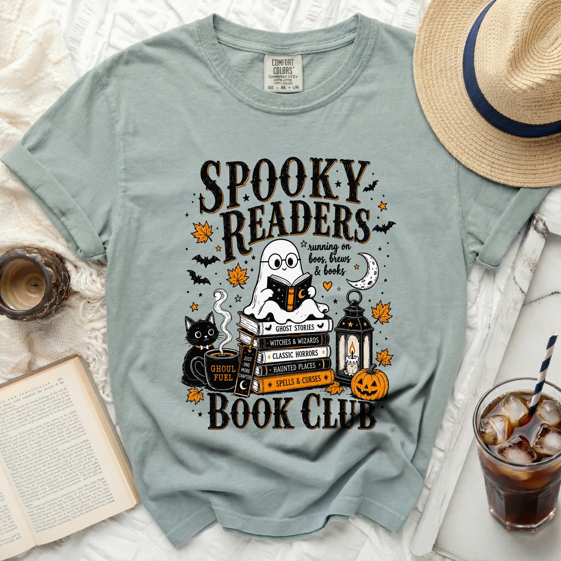Spooky Readers Book Club t-shirt with ghost, cat, pumpkin, and book graphics.