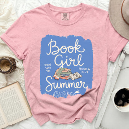 Pink t-shirt with "Book Girl Summer" text and stacked books graphic.