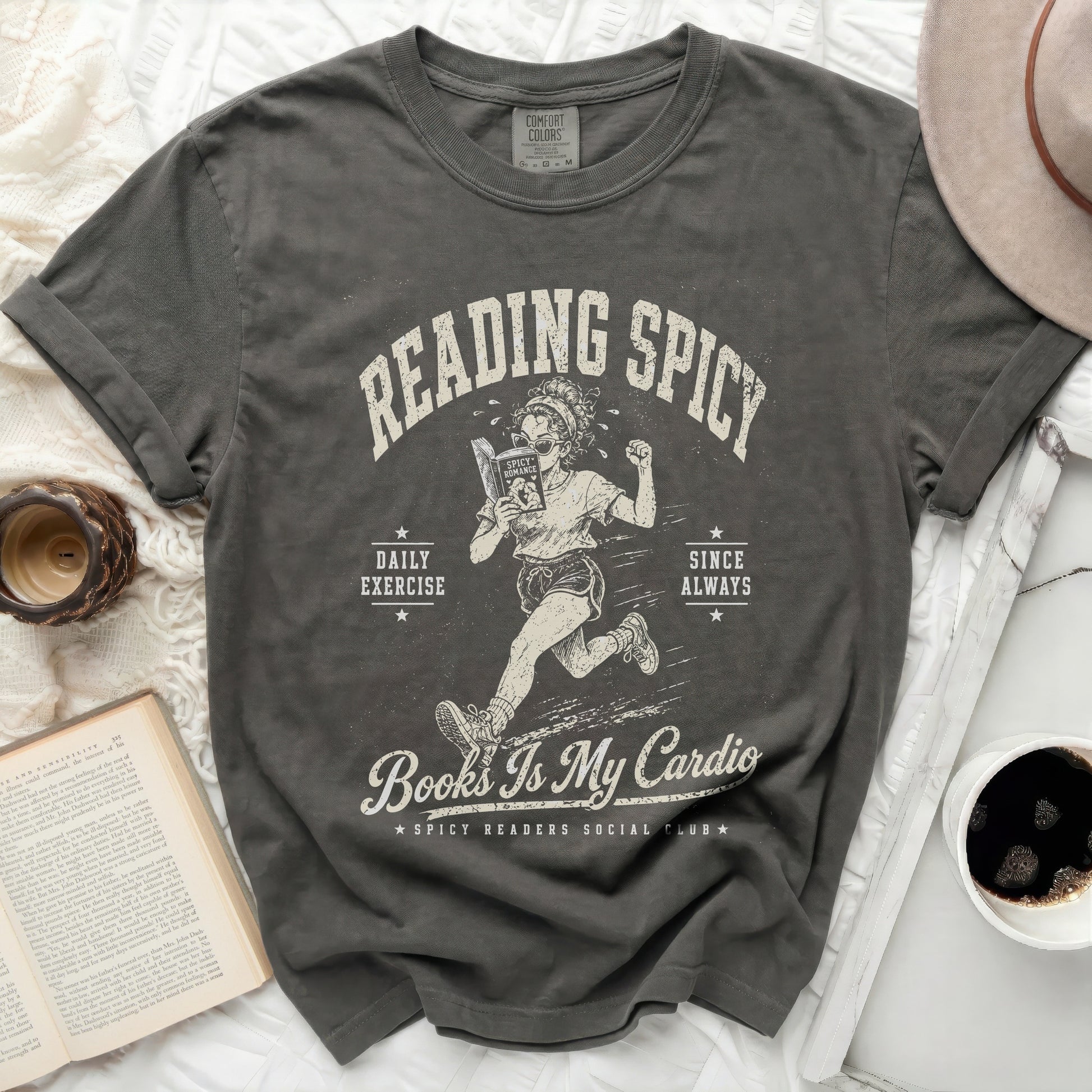 Dark t-shirt with "Reading Spicy" and "Books Is My Cardio" graphic.