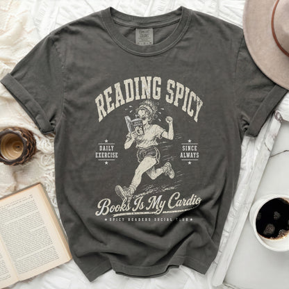 Dark t-shirt with "Reading Spicy" and "Books Is My Cardio" graphic.