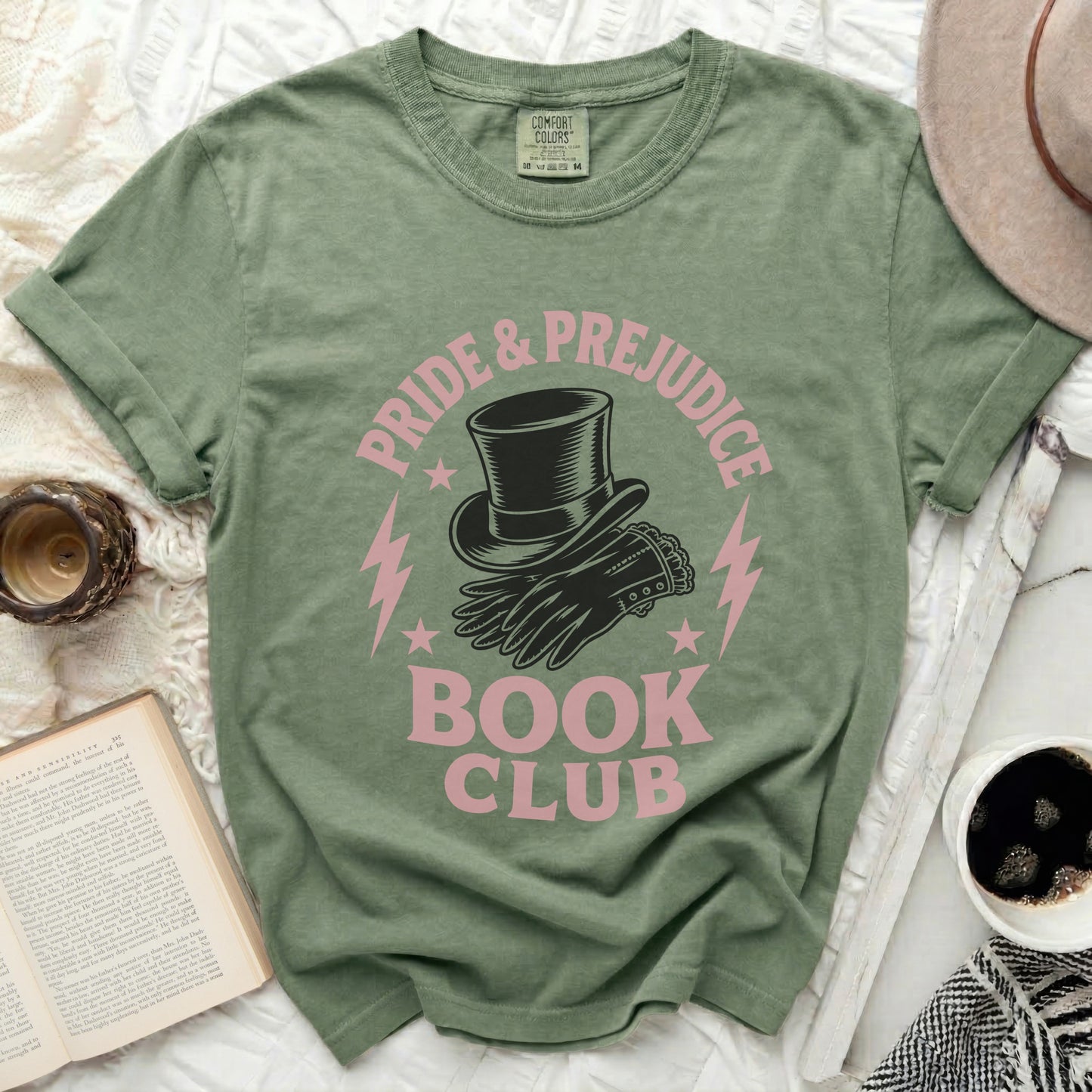 Green t-shirt with "Pride & Prejudice Book Club" logo and top hat graphic.