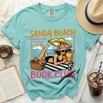 Teal t-shirt with "Sandy Beach Unapologetically Anti-Social Book Club" graphic.