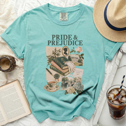 Teal t-shirt with "Pride & Prejudice" text and vintage illustrations of books.