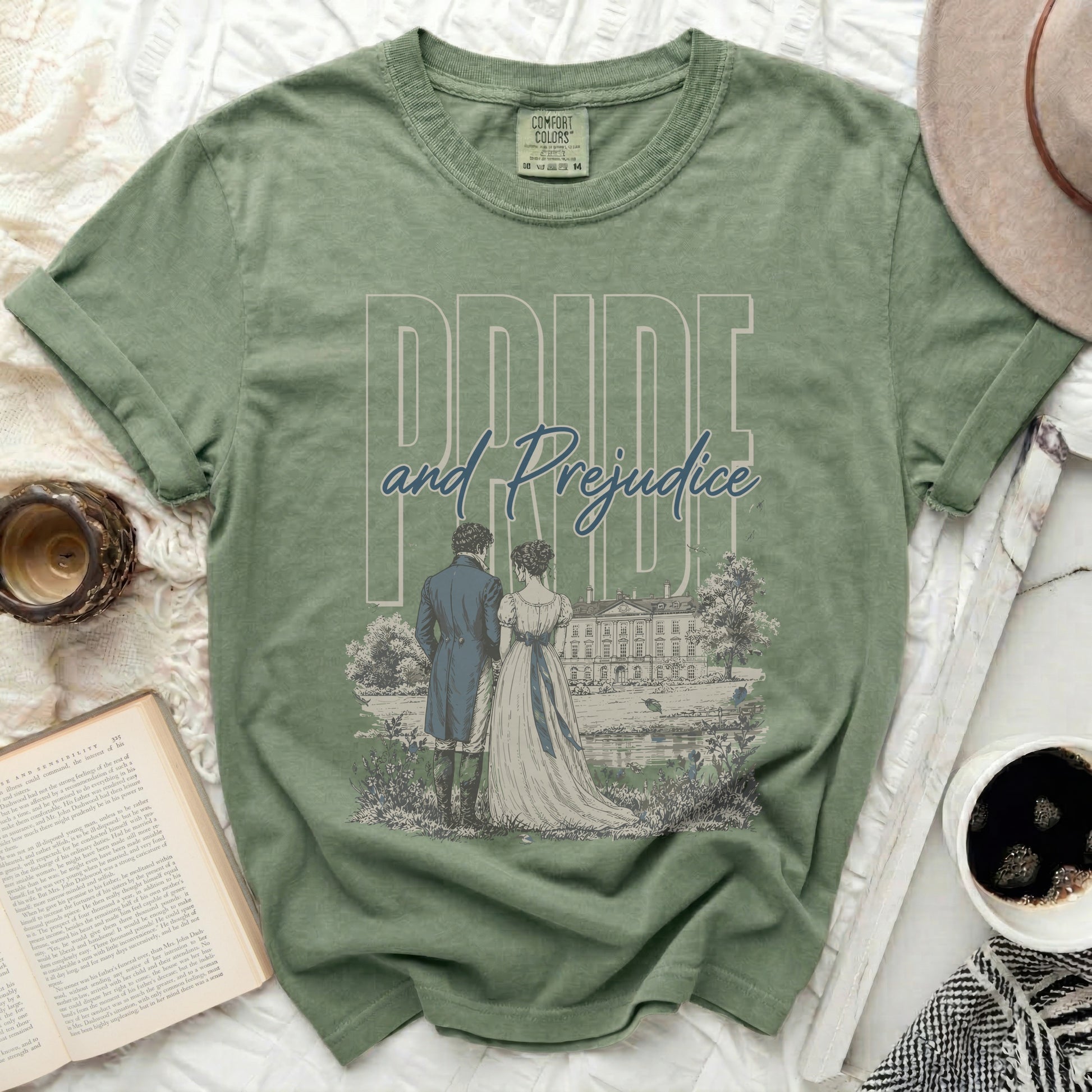Sage green Comfort Colors t-shirt with "Pride and Prejudice" graphic design.
