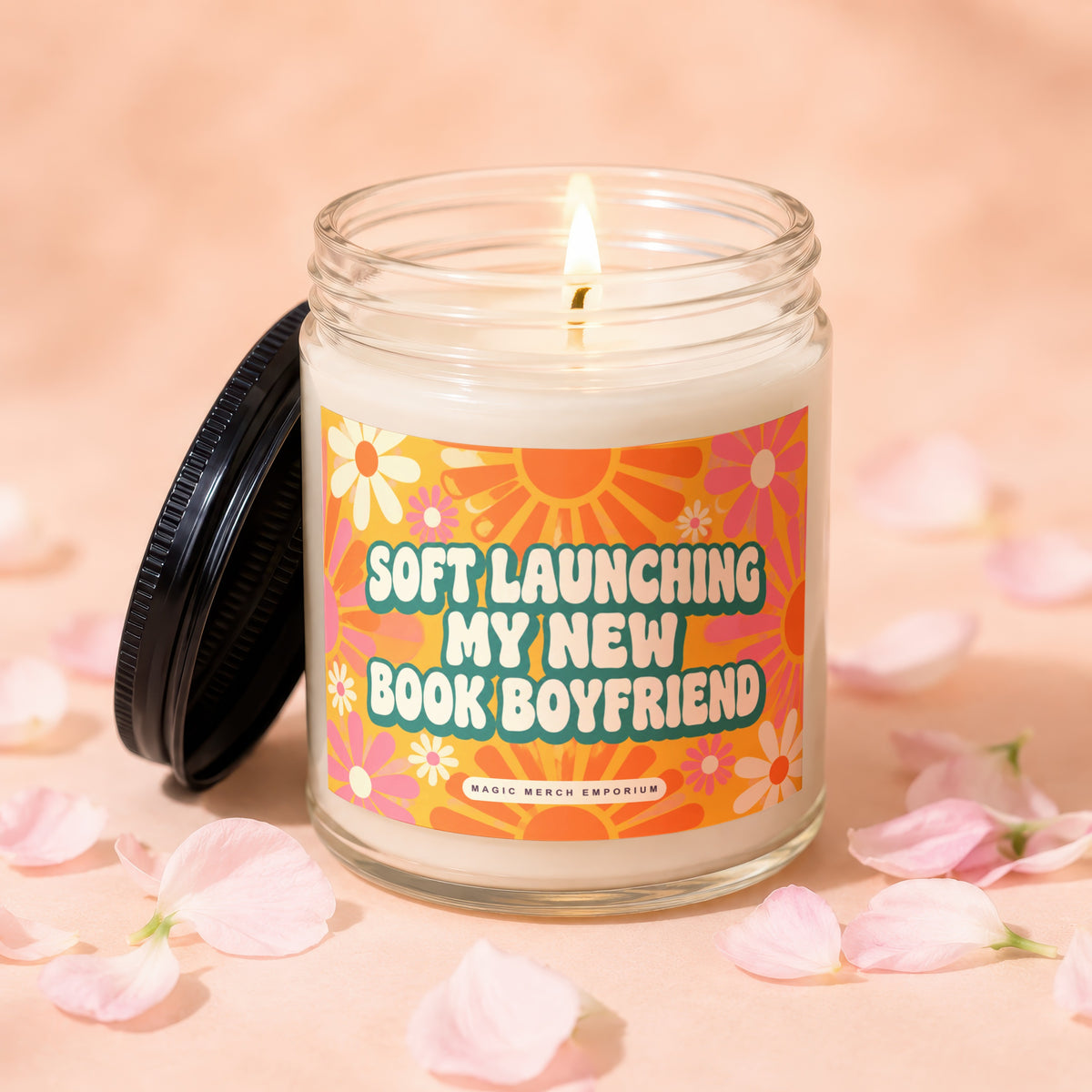 Glass candle with "Soft Launching My New Book Boyfriend" text and floral design.