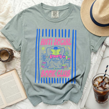 T-shirt with "Anti Social Book Club" graphic featuring a person reading.