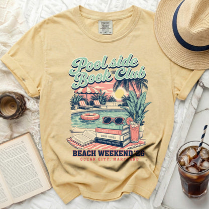 T-shirt with "Poolside Book Club" design, pool, and beach reads.