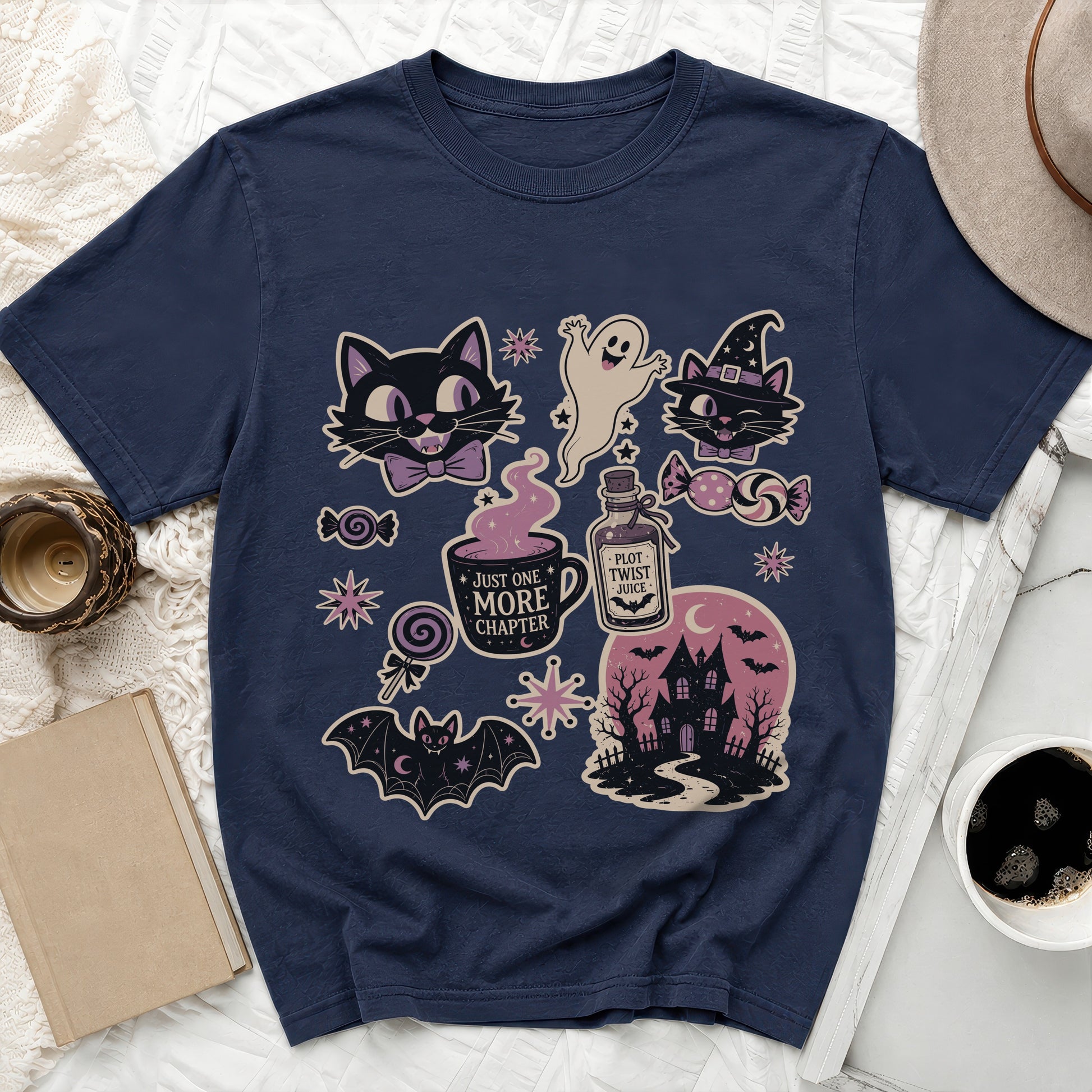 Navy t-shirt with Halloween graphic featuring cats, ghost, haunted house, and text.