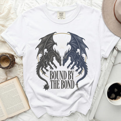 White t-shirt with two dragons facing each other, text "BOUND BY THE BOND".