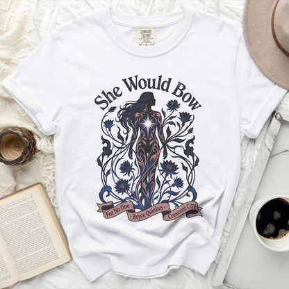 White t-shirt with "She Would Bow" and floral design.
