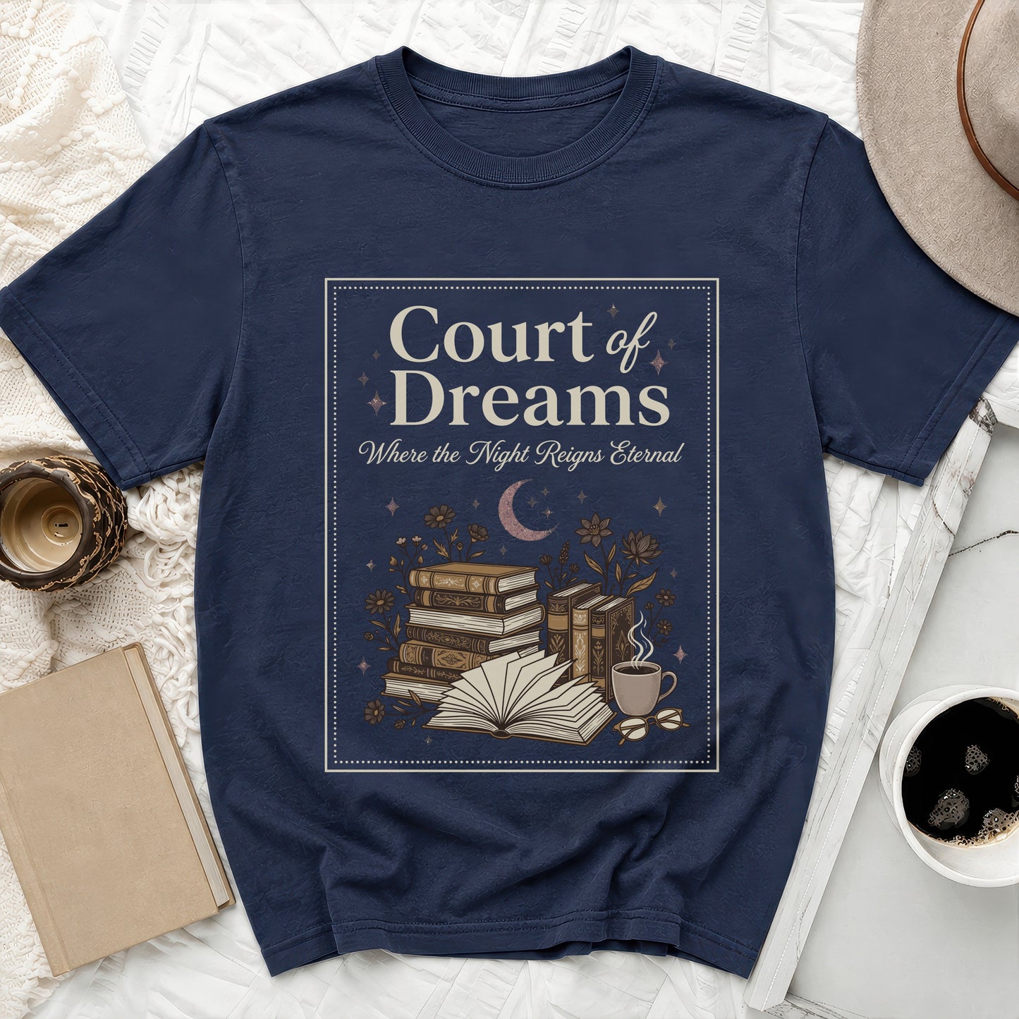 Navy t-shirt with "Court of Dreams" text and a book-themed illustration.