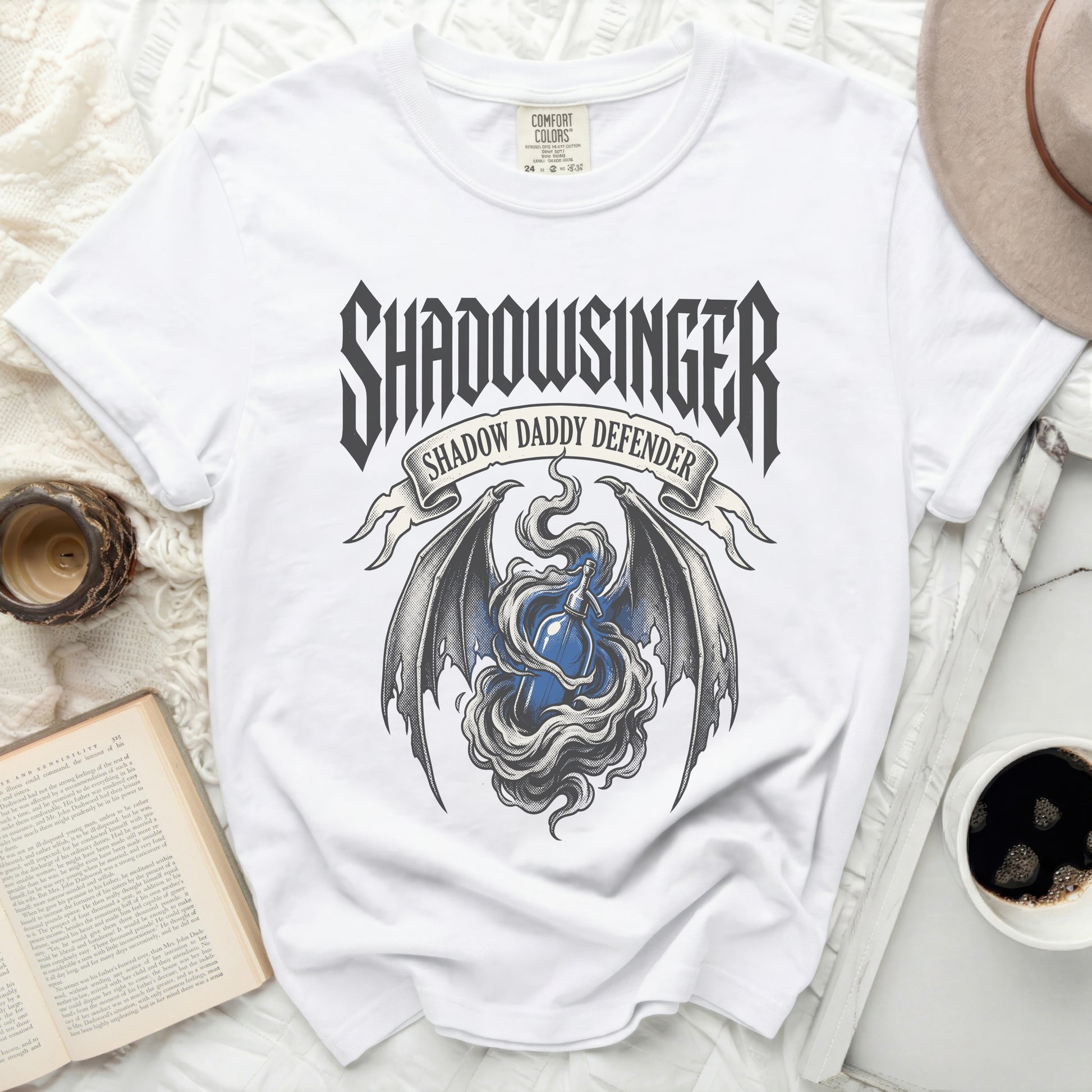 White t-shirt with "Shadowsinger" and "Shadow Daddy Defender" text and dragon graphic.